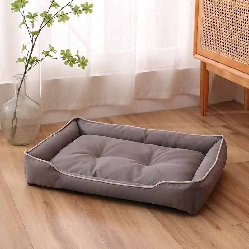 Panier pour chien gris avec rebords rembourrés